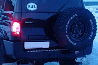 Бампер РИФ силовой задний УАЗ Патриот (2005-2014) с квадратом под фаркоп и калиткой, лифт 65 мм